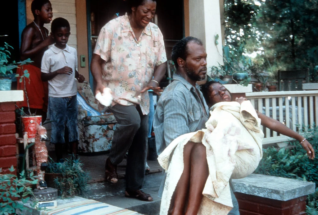 Extreme close-up of Samuel L. Jackson sweating, illustrating the intense lighting and makeup effects used to depict the Mississippi heat in A Time to Kill.