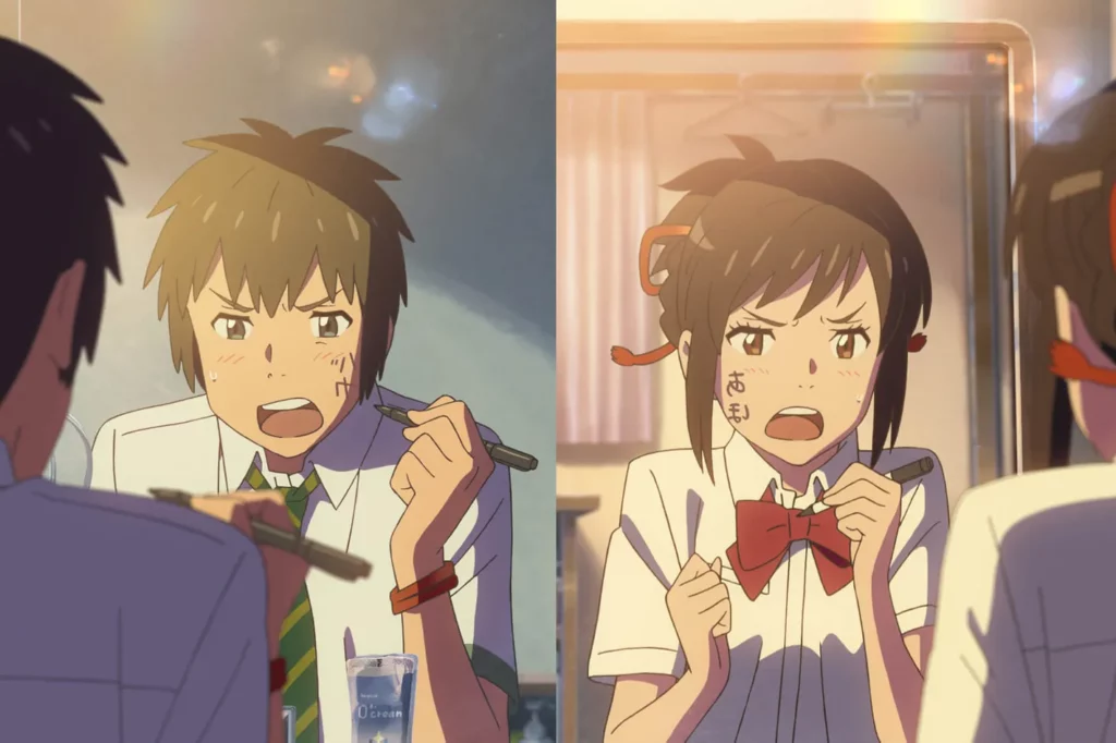 Split screen from the Your Name 2016 movie showing Taki and Mitsuha writing messages on their faces during a body swap sequence to maintain continuity.