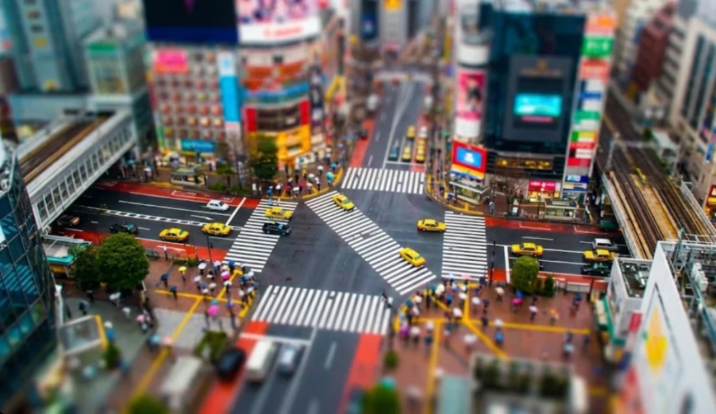 Tilt shift lens miniature effect creating toy-like city street photography