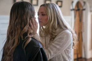 Intense emotional confrontation between two women inside a modern house, key dramatic moment from The Housemaid movie
