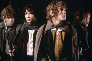 Classic Lord of the Rings fellowship moment with four hobbits on a dangerous Middle-earth journey
