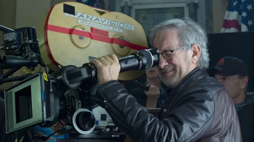 Steven Spielberg directing on set with a cinema camera, emphasizing storytelling over technology for filmmakers