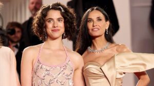 Two versions of the protagonist at a film premiere in The Substance (2024), symbolizing identity and transformation