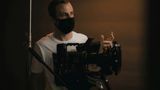 film crew shooting movie scene using professional cinema camera equipment