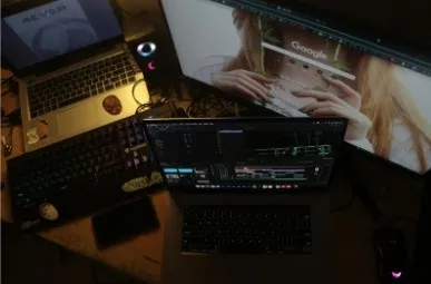 A laptop screen displaying film scheduling software with scene breakdowns