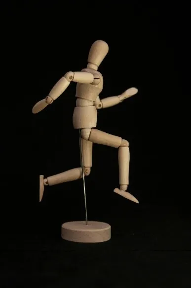 A downward view of a character standing, making them look small and vulnerable.