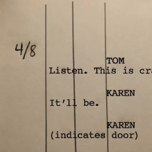 A photograph of a physical script page with vertical lines drawn through a scene and the notation '4/8' written in the margin.
