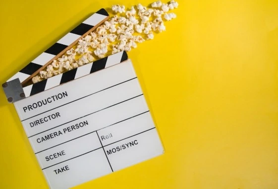 A simplified shooting schedule grid showing three scenes with different cast IDs and page lengths.