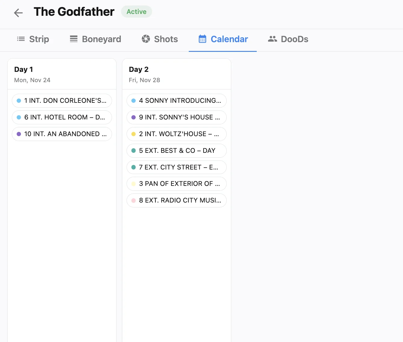 Studiovity Calendar tab for The Godfather showing Day 1 and Day 2 cards with color-coded scheduled scenes